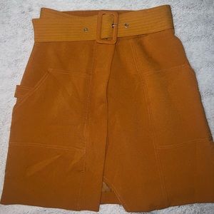 High waist orange mini skirt with wide belt. Like new!